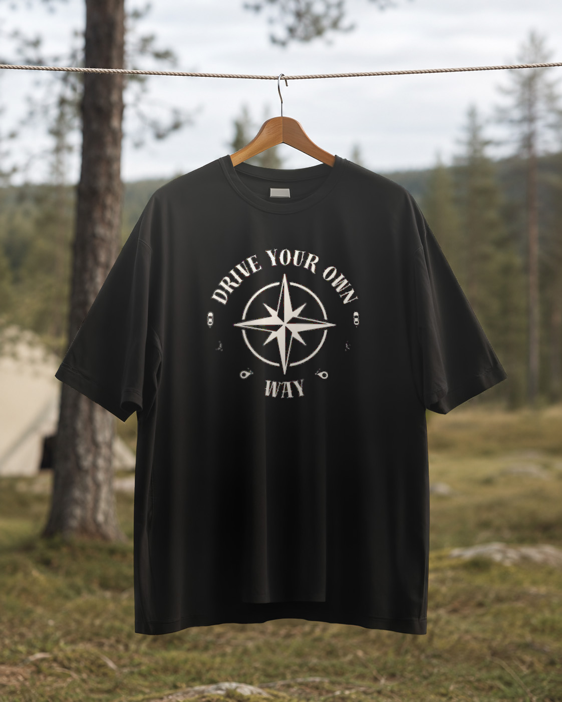 Drive Your Own Way – Unisex T-Shirt Camping Vibes Black – Rückansicht auf der Wäscheleine