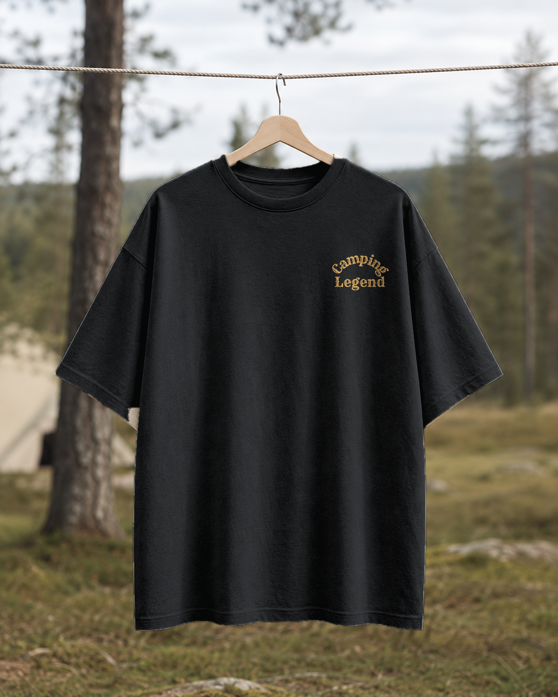 Fire & Freedom – Unisex Oversize T-Shirt Black – Vorderansicht auf der Wäscheleine
