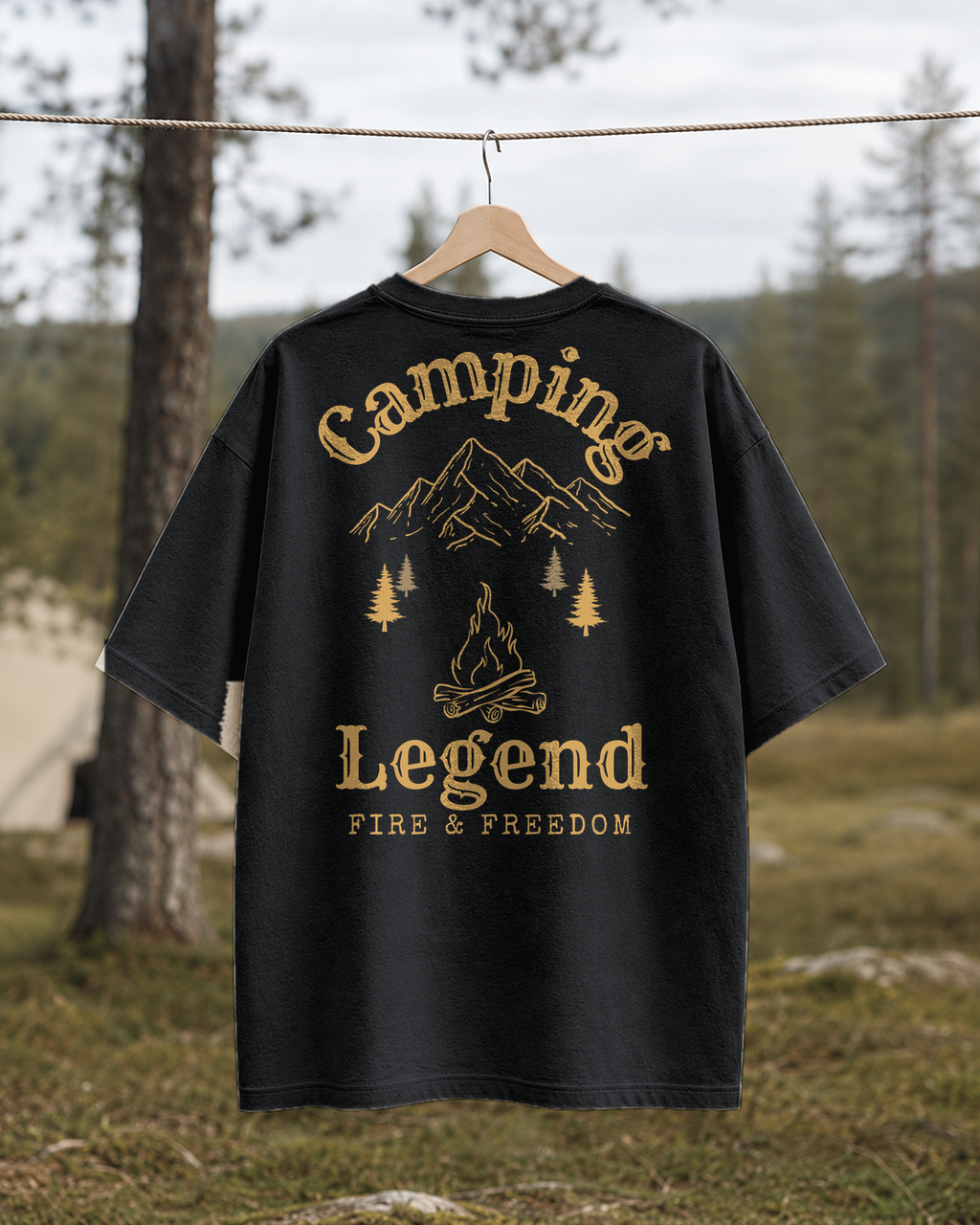 Fire & Freedom – Unisex Oversize T-Shirt Black – Rückansicht auf der Wäscheleine