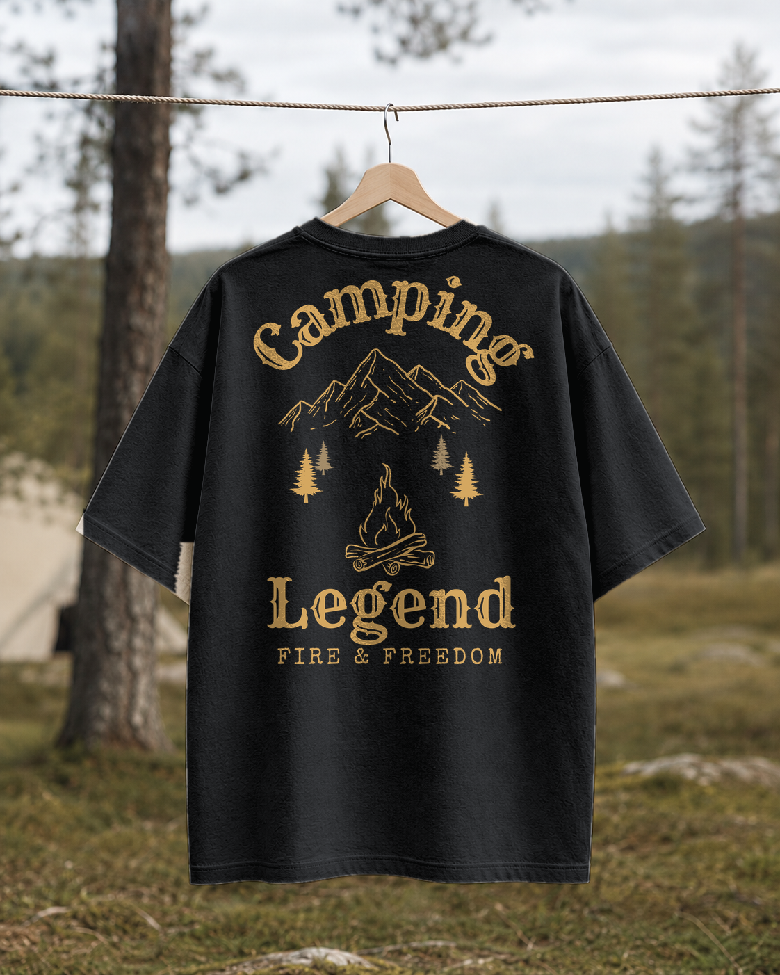 Fire & Freedom – Unisex Oversize T-Shirt Black – Rückansicht auf der Wäscheleine
